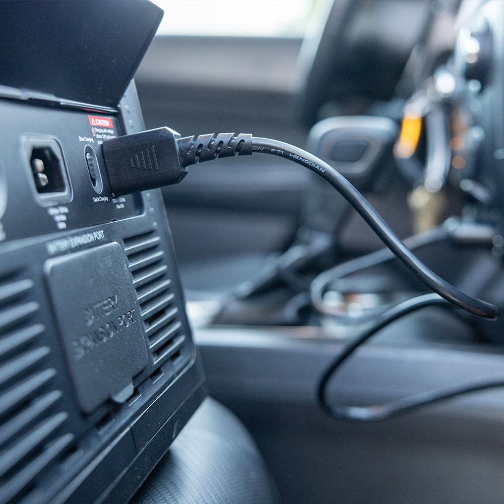 grid doctor plugged into a car power port